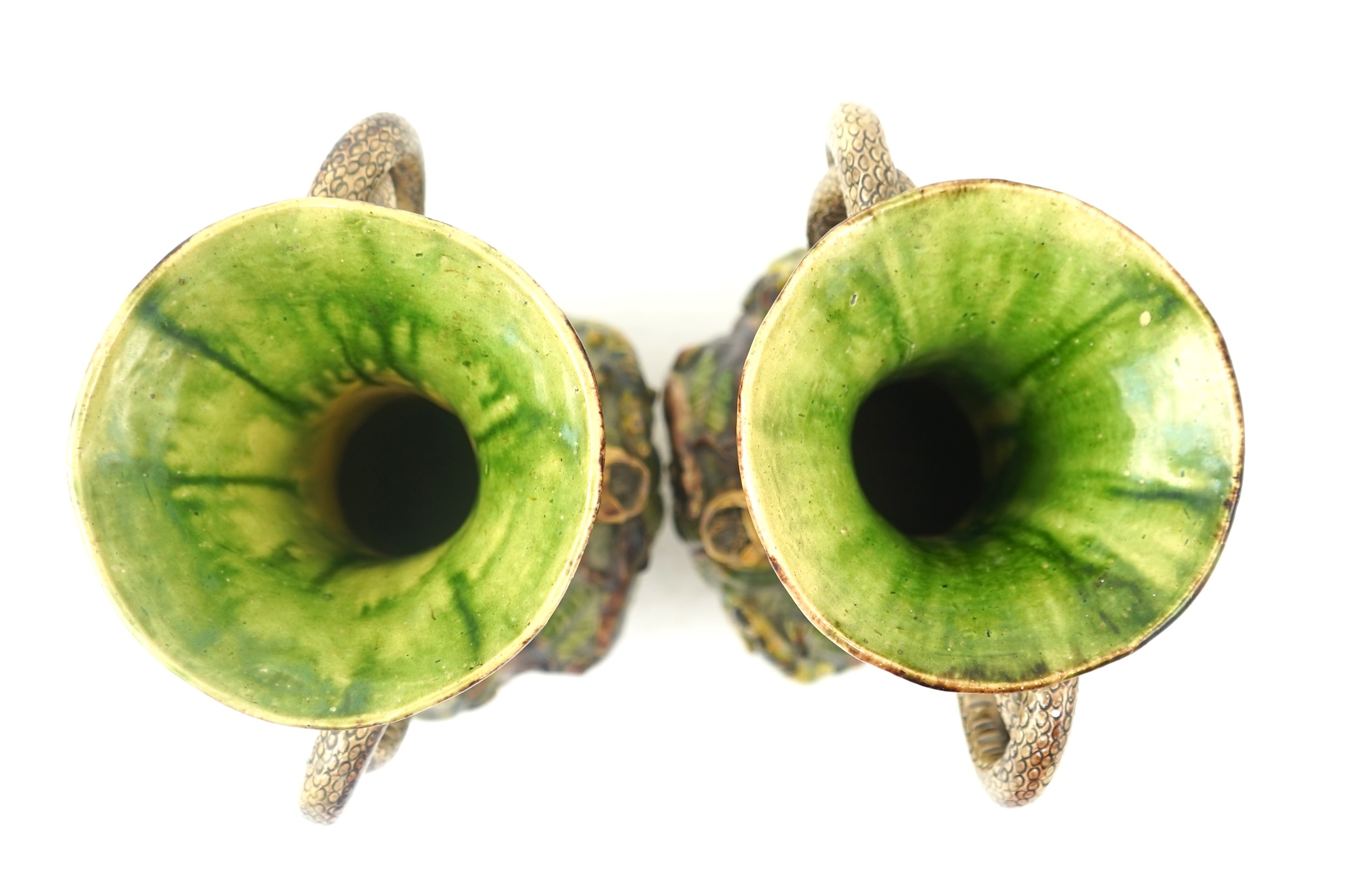 A pair of Palissy ware two handled vases, by Mafra Caldas Da Rainha, late 19th century